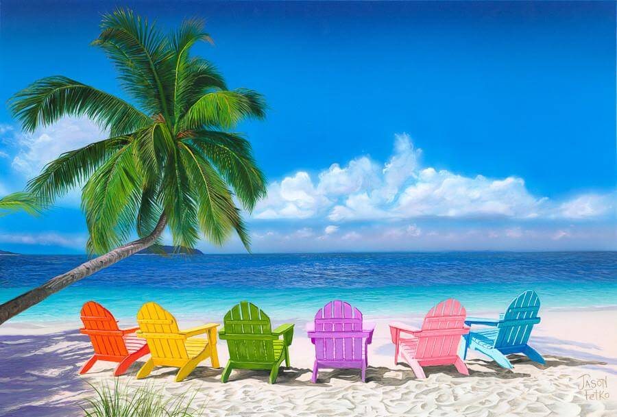 beautiful beach with colored lounge chairs facing oceanfront
